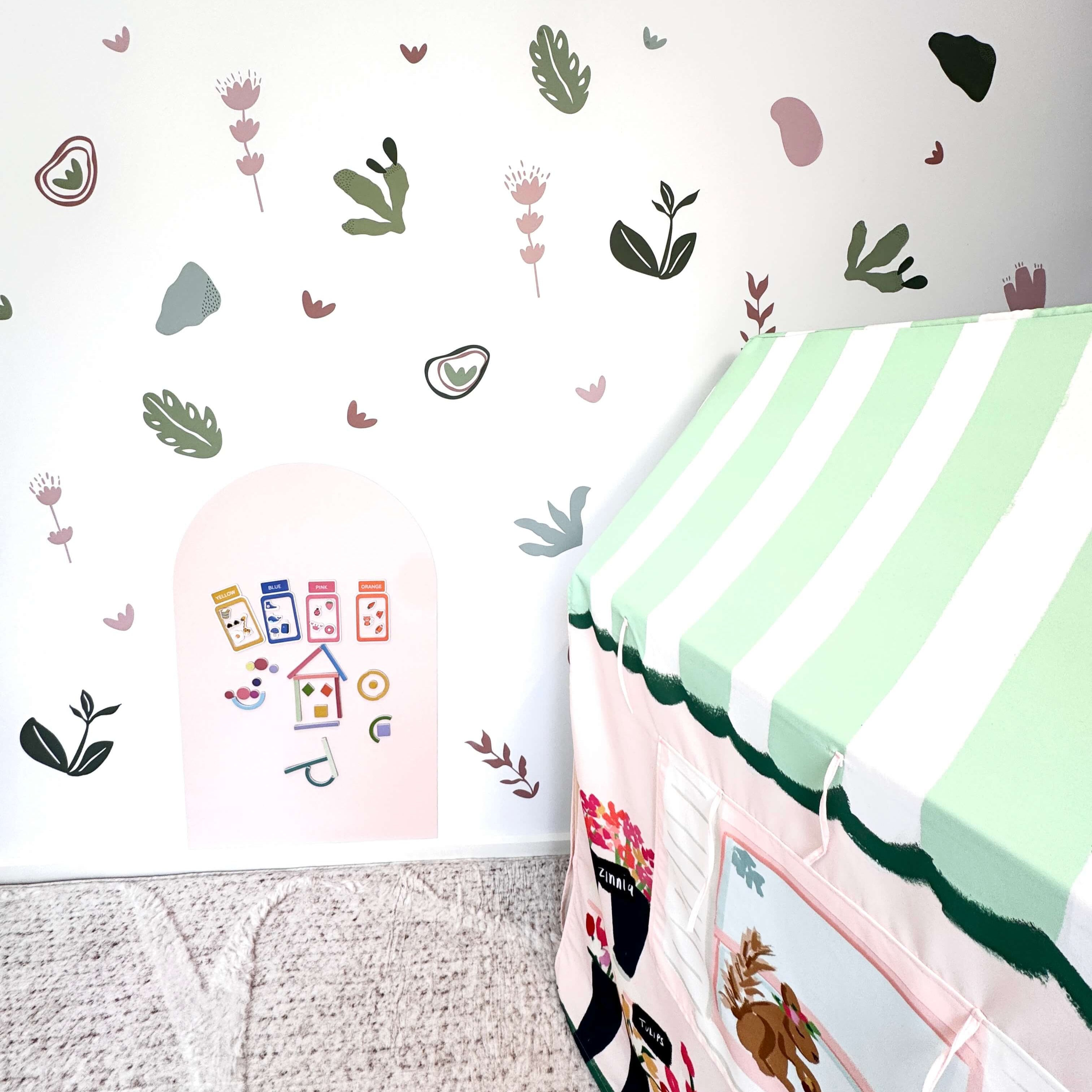 pink shapes of nature decals in playroom
